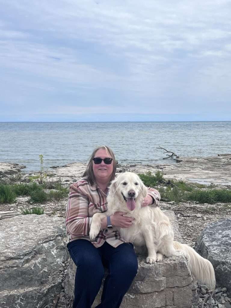 sitting with gracie infront of lake erie